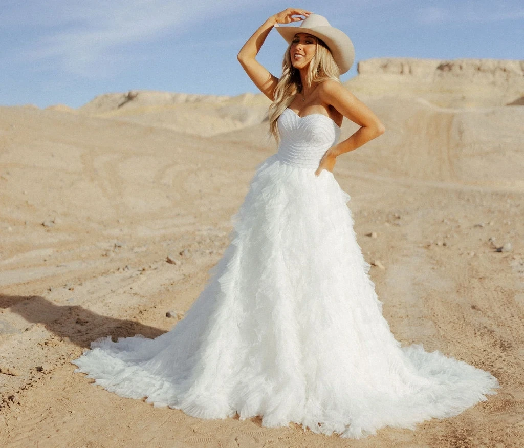 Photo of the model wearing a Ballgown Dresses gown