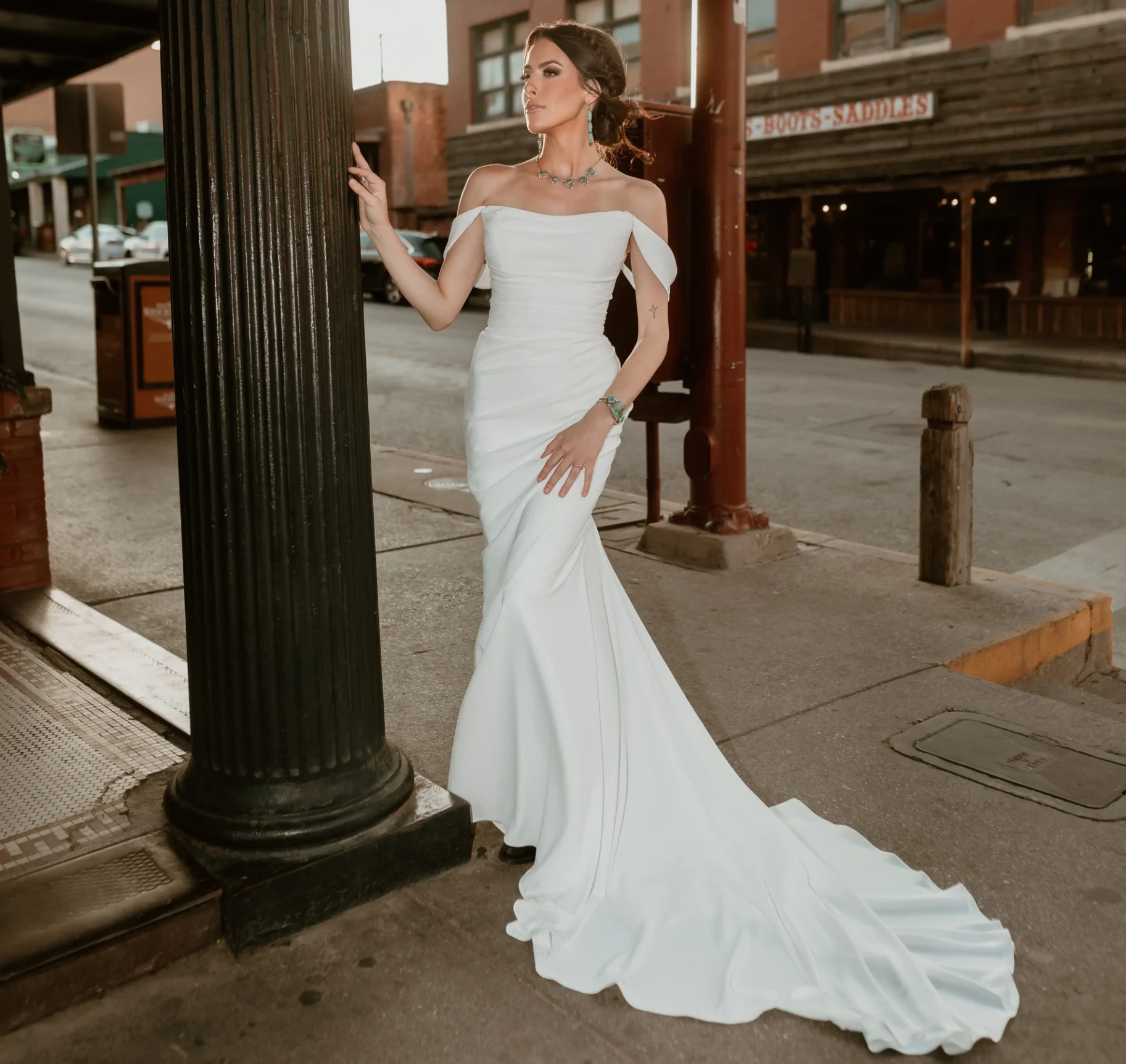 Photo of the model wearing a Sleek Dresses gown