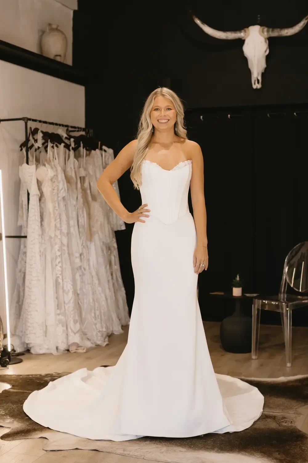 model is wearing a minimalist bridal gown